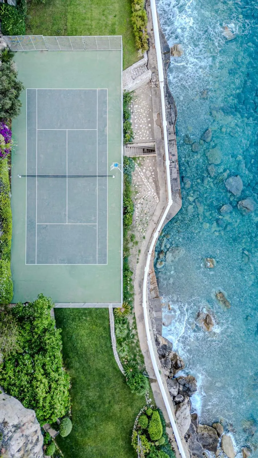 Cap Estel wedding venue tennis court by the sea