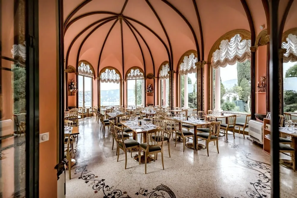 Villa Ephrussi de Rothschild wedding indoor dinner under the arched windows