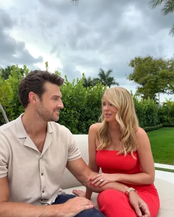 Jamie and Chase seated outdoors, talking about their wedding
